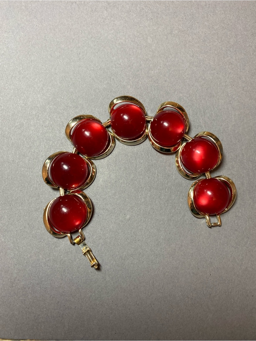 Vintage cranberry red moo glow lucite bracelet